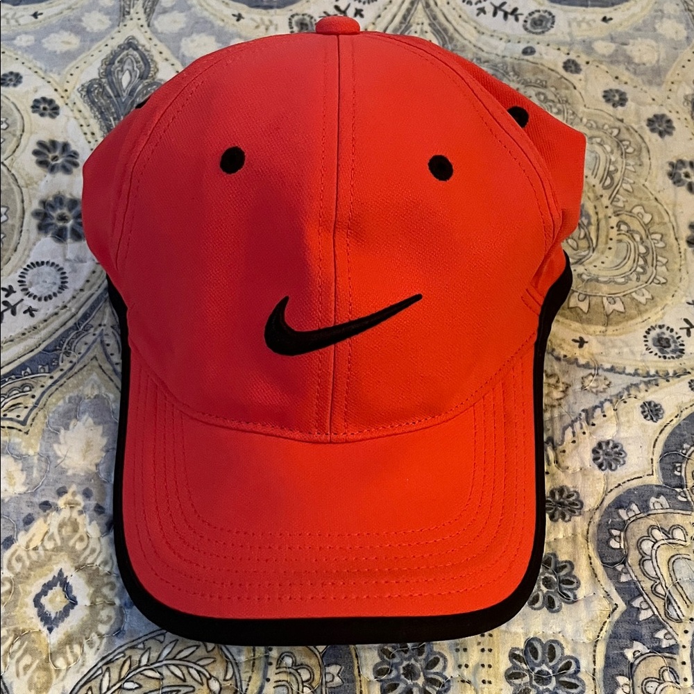 Nike women’s pink golf hat with Black Trim